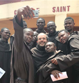 Fr. Federico Trinchero, Carmelite missionary, with his young brothers in front of Saint Marc Major Seminary in Bangui.